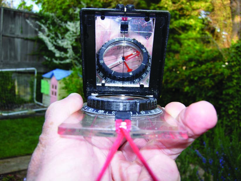 Sighting a bearing with a mirror compass